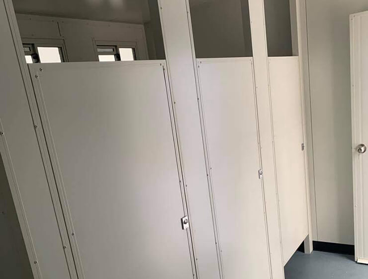 Cubicles in portable toilet block